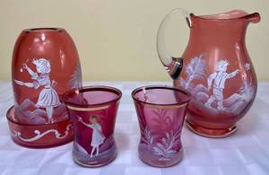 lot 98 image: Vintage Cranberry Mary Gregory Hand Painted Pitcher with Little Boy & Bird, Fairy Lamp (2 pieces) and Handpainted Toothpick Holders