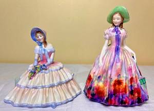 lot 45 image: Royal Doulton Easter Day HN 2039 and Daydreams HN 1731 porcelain figurines