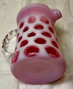 lot 67 image: Fenton Cranberry Opalescent Glass Coin Dot Optic 4 Creamer Pitcher and  5 Pitcher