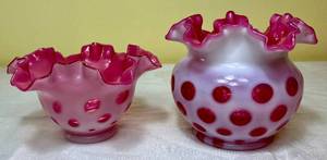 lot 68 image: Fenton Cranberry Opalescent Coin Dot Pattern 5 H x 6 W Rose Bowl and Coin Dot Ruffled 3.5 Bowl