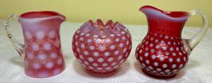 lot 70 image: Vintage Fenton Coin Dot Cranberry 4 Creamer,  Small 4 Pitcher and 3 Rose Bowl
