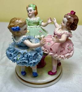lot 103 image: Vintage MZ Irish Dresden Lace Porcelain Ring A Ring A Rosie 3 Children Porcelain Figurine