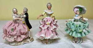 lot 113 image: Sandizell West Germany Dresden Lace Porcelain Set of 3 Figurines Dancing Pair, Lady with Umbrella and Lady in Pink with Flowers