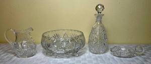 lot 61 image: Vintage American Cut Crystal Collection - 3 Footed Bowl, Decanter, Mini Pitcher and Sawtooth Rim Candy Dish