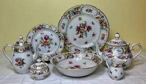 lot 43 image: Schumannn- Bavaria Germany US Zone Empress Dresden Flowers China  - 2 salad plates, teapot, 2 cup mini coffee pot, egg cup, creamer and sugar dish
