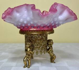 lot 81 image: Vintage Fenton Cranberry Hobnail BowlDish with Golden Cherub Base 5 H x 6 W