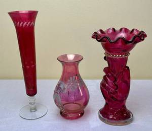 lot 168 image: Cranberry Glass Liberty Torch Vase 8.5 H x 4.5 W, Vintage Rainbow Cranberry Glass Hand Painted 6 H x 4 W and Cranberry Red Etched Bud Vase 10 H x 2.75 W