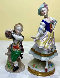 lot 150 image: Vintage Sitzendorf Porcelain Figurines- Boy Carrying Wood 5.25 H and Woman in Floral Dress 7.25 H