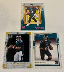 lot 32F image: Jalen Hurts 3 Card RC Lot - 2020 Gridiron Kinds, Chronicles Donruss Rared Rookie, and Elite Rookies Football Cards