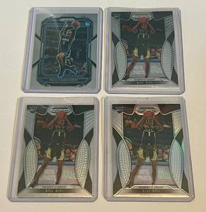 lot 28D image: (3) Bol Bol Bol and (1) Paolo Banchero RCs 2019 Prizm Draft Picks #45 and 2022-23 Prizm #249 Rookie Basketball Cards