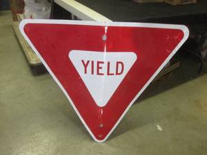 lot 105 image: (BR1) Retired YIELD Street Sign Has Bends and Brackets On Back 33 W x 29 12 H