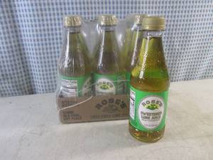 lot 315 image: (B-1) 6 Bottles Roses Sweetened Lime Juice From Concentrate12oz Past Date