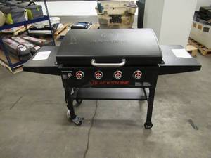 lot 125 image: Blackstone 36in. Griddle with Hood & Front Shelf - Costco Exclusive - Minor Scratches  Minimal USE