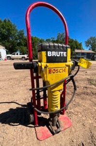 Jack Hammer with Bits and Roller Rack