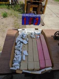 Flat of magnetic door catches. Approx 300. As shown.