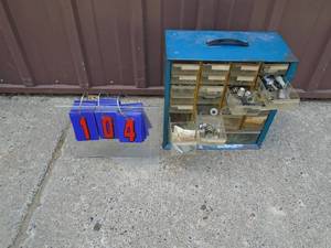 Organizer with ham radio parts. As shown.