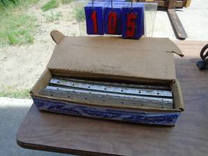 Flat of piano hinges. As shown.