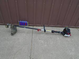 Craftsman 4 cycle weed trimmer. Lightly used. Tested & works. As shown.