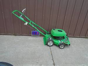 Vintage Lawn Boy. Not pretty but works. As shown.