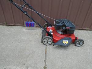 MTD push lawn mower. Used condition. Tested & works. As shown.