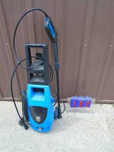 1500 psi electric pressure washer with hose & wand. Powers up. As shown.