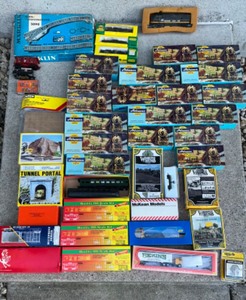 lot 109 image: Huge Lot of Model Train Accessories - Tracks, Mini Figurines, and More