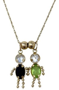 lot 162 image: Elegant 14k gold pendant necklace, featuring two exquisite 10k zodiac charms.
