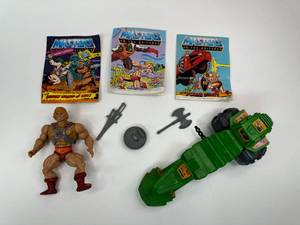 lot 6 image: Vintage Masters of the Universe - Heman Figure Complete with Road Ripper  3 Mini Comic Books