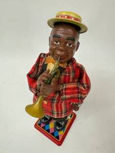 lot 48 image: Vintage Tin Windup Louis Armstrong - Works Great