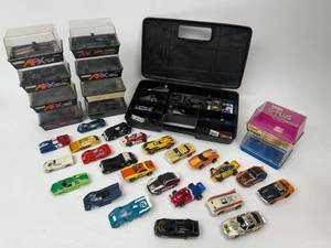 lot 54 image: Vintage Slot Car Lot with Boxes and Spare Parts Box