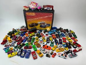 lot 73 image: Vintage Hotwheels, Matchbox, Tomica, Micro Machines, Misc. Car Truck Lot with Carrying Case