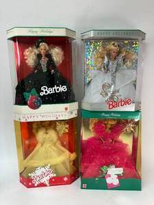 lot 118 image: Four Happy Holiday Barbies - 1989, 1990, 1991, 1992