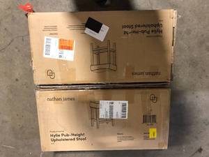 lot 14 image: Lot of 2  Nathan James Hylie 29 in. Beige Fabric Cushion Light Brown Finish Nailhead Wood Pub-Height Counter Bar Stool  Customer Returns See Pictures