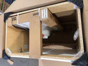 lot 24 image: Glacier Bay 31 in. W x 19 in. D x 35 in. H Single Sink Freestanding Bath Vanity in White  Top Not Included  Customer Returns See Pictures
