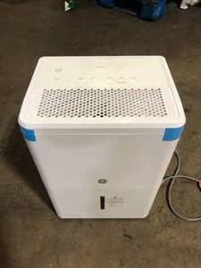 lot 44 image: GE 22 pt. Dehumidifier with Smart Dry for Bedroom, Basement or Damp Rooms up to 1500 sq. ft. in White  Customer Returns See Pictures