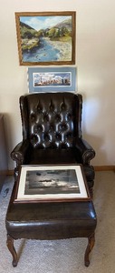 lot 22 image: Leather Chair and Ottoman with Artwork