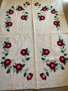 lot 58 image: Handmade Quilt 93 x 37 Floral Pattern