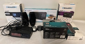 lot 67 image: Sirus XM and Logitech Electronics NIB
