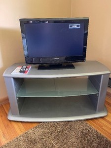 lot 17 image: Magnavox Televison 26 with DVD player and TV Stand