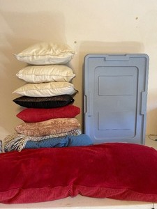 lot 100 image: Pillows and Tote Blue Woolrich Lap Blanket etc.