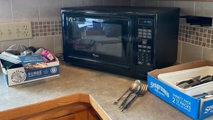 lot 70 image: Whirlpool Microwave, Knives and Utensils