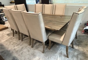 lot 2 image: Natural Wood Dining Table with 10 Charming Chairs