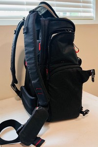 lot 77 image: Solid Backpack in Blue and Gray by Tumi with Monogrammed