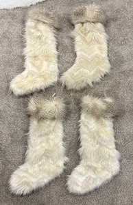 lot 130 image: Fuzzy and Furry Stockings and Tree Skirt
