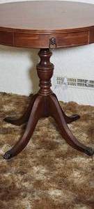 lot 61 image: Vintage Pawfoot Drum Table