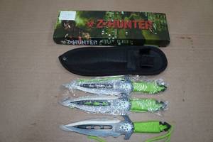 lot 15 image: Zombie Hunter Throwing Knife Set