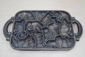 lot 64 image: Vintage Cast Iron John Wright Animal Puzzle Cookie Mold