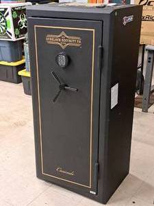 lot 1 image: Surelock Security Co Gun Safe with Key and Combination
