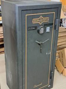 lot 2 image: Surelock Security Co Gun Safe with Key and Combination