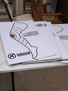 lot 27 image: Lot of (10) Krate Tactical Leg theme Cardboard Targets